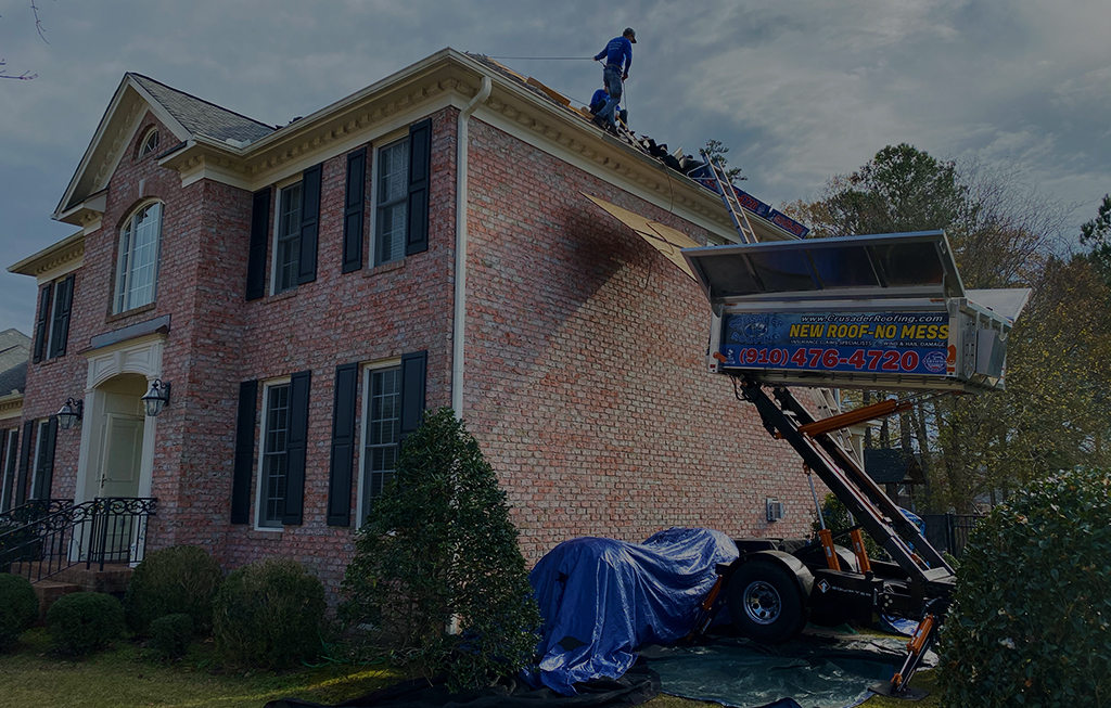 Crusader Roofing’s Equipter debris trailer on a job site